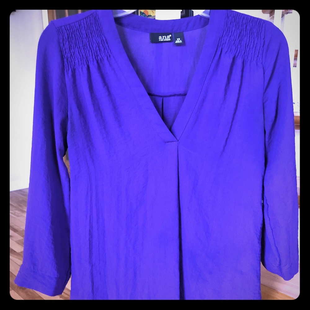 Purple 3/4 sleeve V neck too with shoulder detail